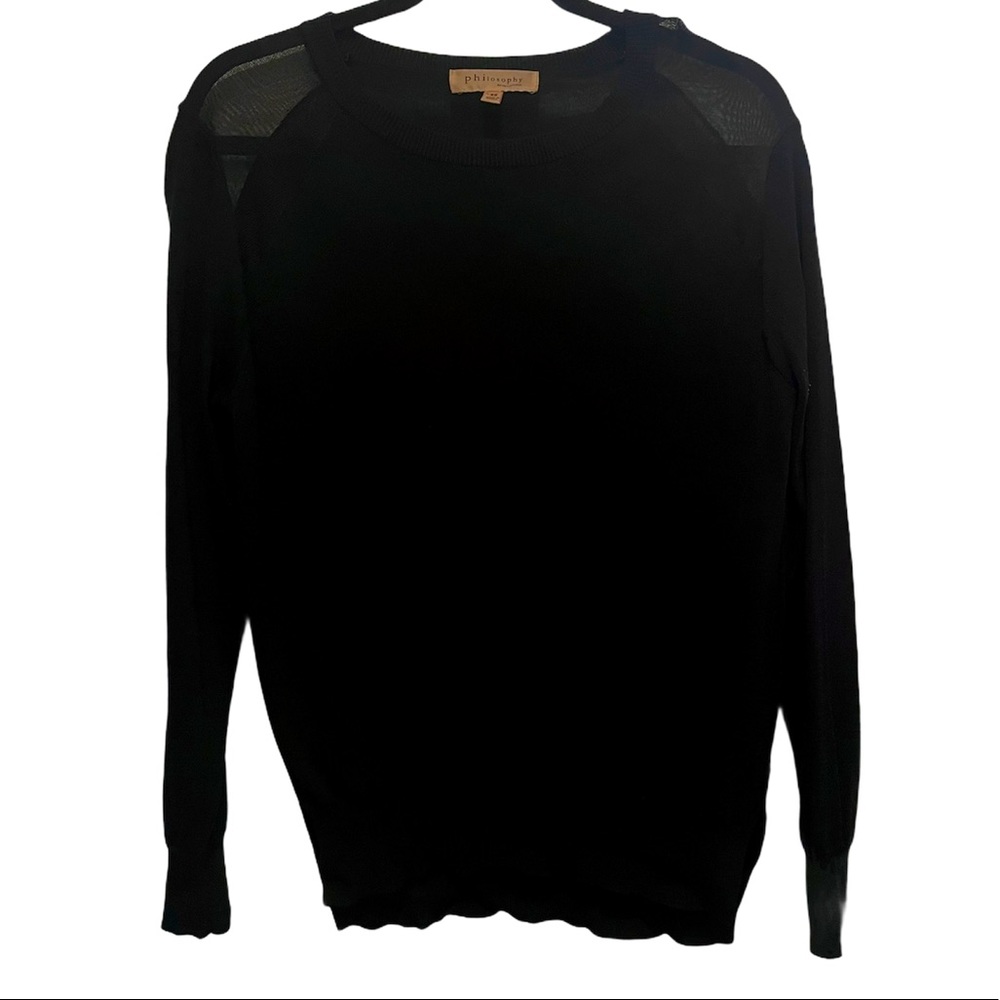 black sweater with sheer shoulder cutouts